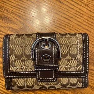 Brown Coach buckle wallet